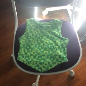 a medium green shirt, crop top